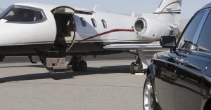 Private Chauffeur Car Waits To Collect Private Jet Passengers