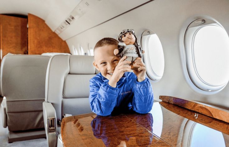Kid on charter jet 